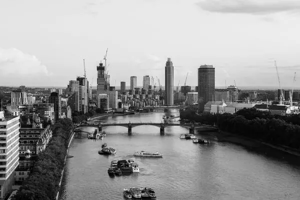 Black and white image of the River Thames running through central London