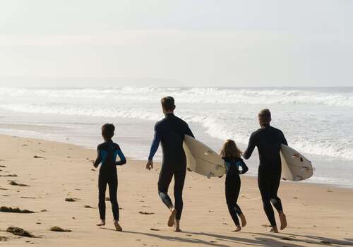 a family having fun at the beach